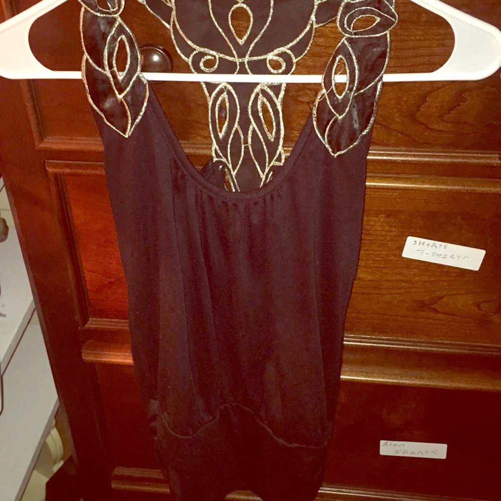 Small black and silver shirt cute for the summer